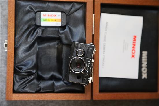 A cased Minox Leica miniature camera, a Minox glass, Contax 1 and a Minox Classic Leica III (3)